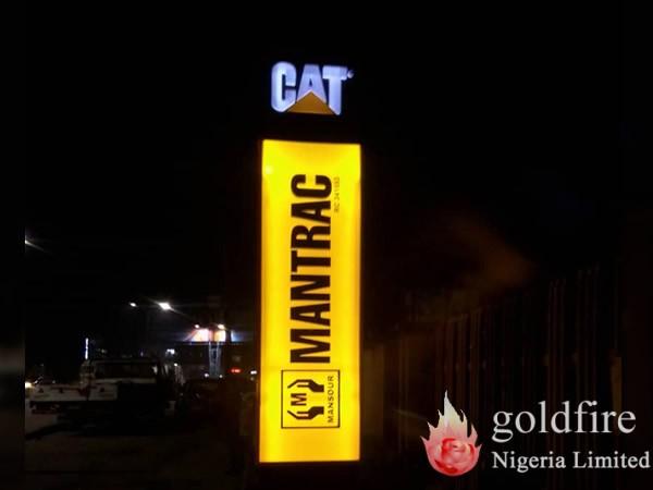 Illuminated pylon sign for Mantrac, Ibadan produced and installed by Goldfire Nigeria Limited.