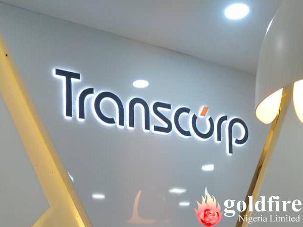 Illuminated Transcorp pylon sign, wall sign and internal signage produced, delivered and Installed by Goldfire Nigeria limited.