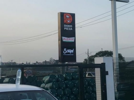 Illuminated pole signage for Dodo Pizza - Gbagada produced and installed by Goldfire Nigeria Limited.