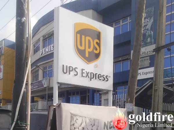 UPS wall fascia and twin Pole signage at Ring Road, Ibadan produced by Goldfire NIgeria Limited