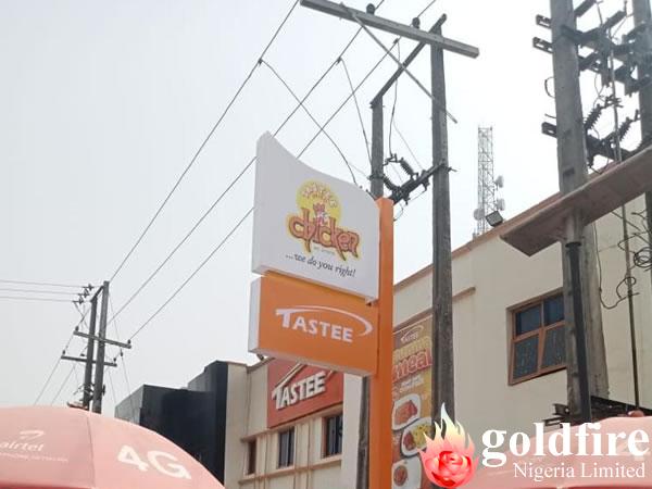 Signage: Exterior Sign & Pylon produced for Tastee Chicken, Ikorodu Branch by Goldfire Nigeria Limited.