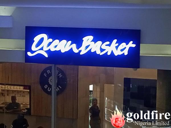 Illuminated signage -Ocean basket Restaurant at Jabi Lake mall, Abuja produced by Goldfire Nigeria Limited.